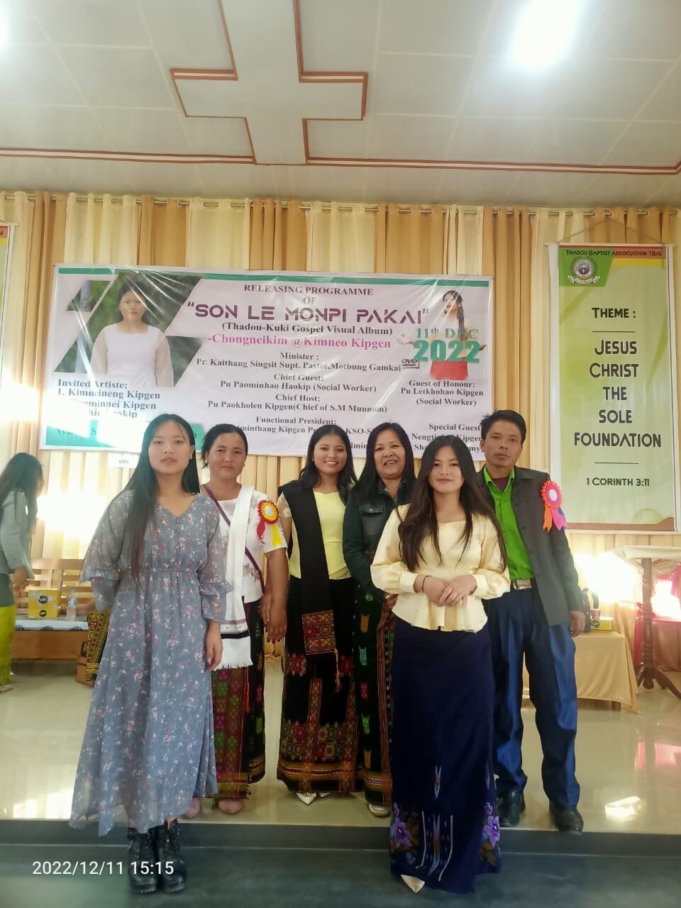 A church gathering in Northeast India beneath a banner reading Jesus Christ the Sure Foundation.